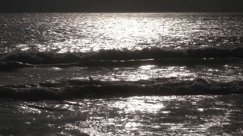 Slow motion seascape view with sun flecks on water surface at sunset. Vídeos de archivo 69803164