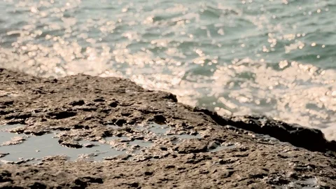 Slow motion seaside - Sparkling fresh wavy water 動画素材 77748600