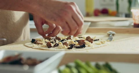 Slow motion selective focus on delicious tasty homemade domestic pizza dressing Stock Footage 218639838
