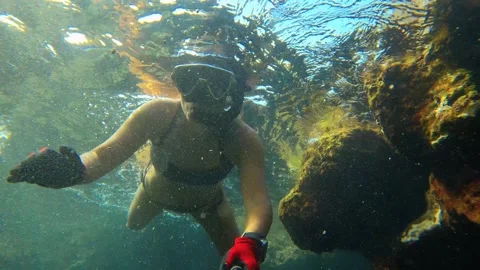  Slow motion self in view of a Asian female snow cover wearing bikini and gloves Stock Footage 315168909