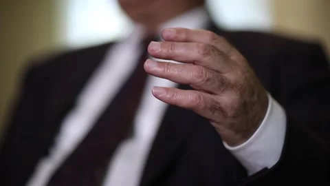 Slow motion Senior Elderly man moves his hands Stock Footage 295434595