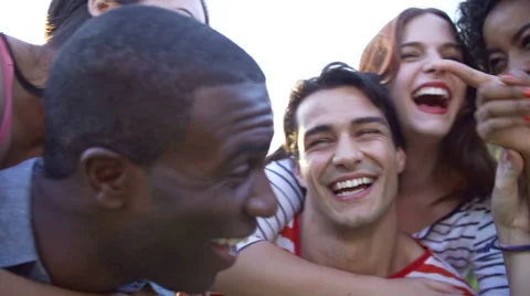 Slow Motion Sequence Of Friends Having Fun In Park Together Vídeos de archivo 40448531