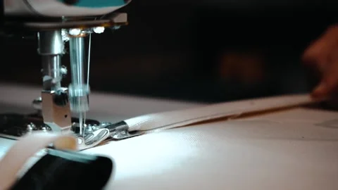 Slow motion sewing machine in action Stock Footage 135269740