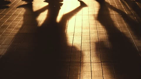 Slow motion of shadow of people walking on the street. Stock Footage 157395851