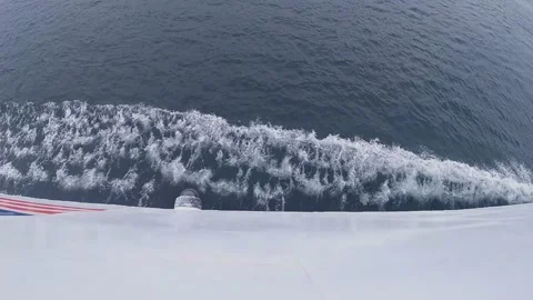 Slow motion ship side moving through water Stock Footage 222990881