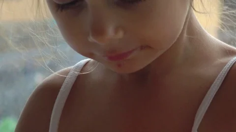 Slow motion shooting of 100 fps a child is eating corn and cheese. Stock Footage 81740419
