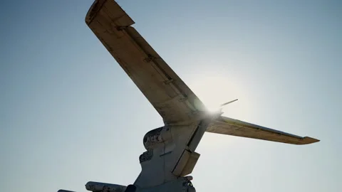 Slow-motion shooting of the back of the aircraft in white against a background Stock Footage 256018142