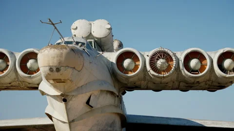 Slow-motion shooting of the engine, wing and nose of the aircraft in white Stock Footage 256017685