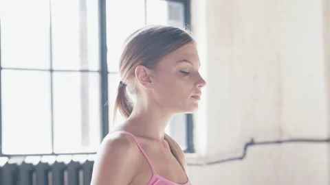 Slow-motion shooting exercises Yoga close-up. Sporty girl doing exercises on Video stock 79102480