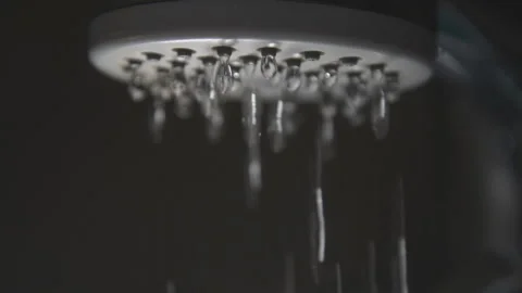 Slow motion shooting of falling water drops from the shower 스톡 동영상 85634892