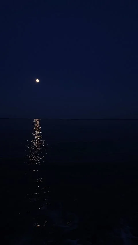 Slow motion shooting golden moon light under the sea water with moon path Stock Footage 159791937
