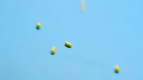 Slow motion shooting. Medication on a clean background homogeneous background, v Vídeos de archivo 142291984