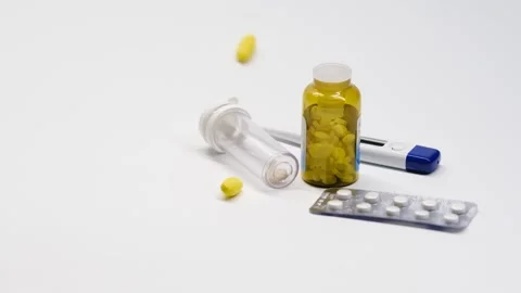 Slow motion shooting. Medication on a clean background homogeneous background, v Vídeos de archivo 142291994
