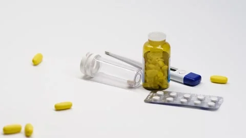 Slow motion shooting. Medication on a clean background homogeneous background, v Video stock 142292119