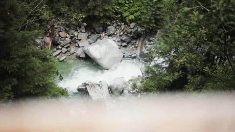 Slow motion shooting from the top of the river in the mountains nature forest Stock Footage 94533438