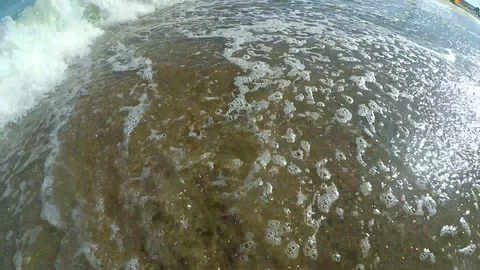 Slow motion shooting wave from lower angle or bottom below. Stock Footage 94233815