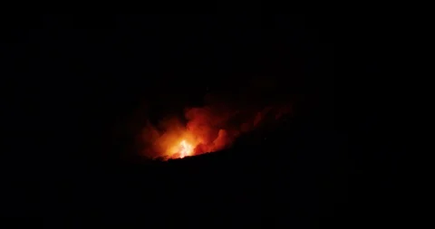 Slow motion shot of an active wildfire Woolsey fire and Hill fire in Santa Stock Footage 98565546
