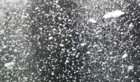 Slow motion shot of air bubbles underwater. Stock Footage 309934637