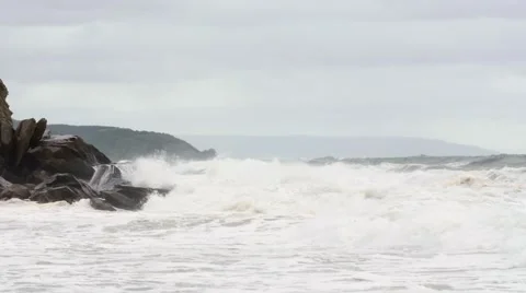 Slow motion shot of amazing ocean waves on shore in storm Stock Footage