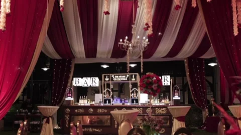 A slow motion shot of a bar at an Indian wedding Stock Footage 298528488
