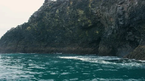 Slow motion shot of blue sea waves and burts of water, Channel Islands Stock Footage 123735737