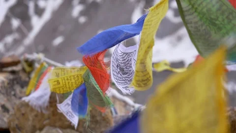 Slow motion shot of Buddhist praying flags waving with the wind Stock Footage 124715864