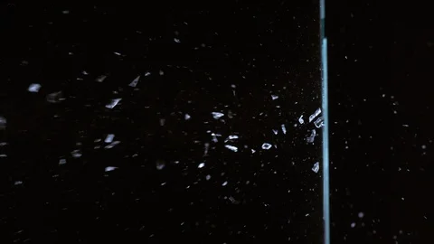 Slow motion shot of bullet shooting through glass, shot with Phantom Flex 4K Stock Footage 101269457