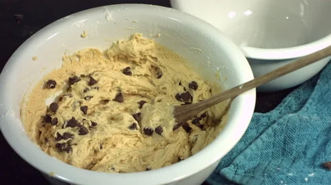 Slow motion shot of cake batter mixing Video stock 67340861