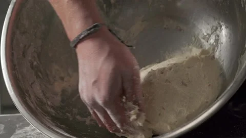 Slow motion shot: Chef kneads the dough for bread. 1080p Stockbeeldmateriaal 138528260