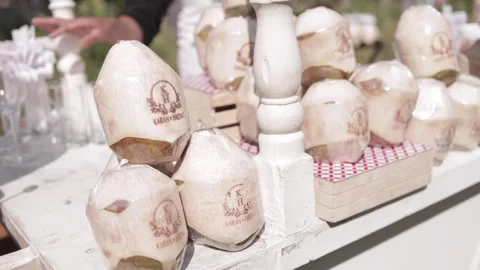 A Slow Motion Shot of a Coconut Counter at an Indian Wedding Venue in India Stock Footage 306037754