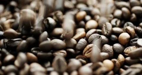 Slow motion shot of coffee beans 스톡 동영상 87619688