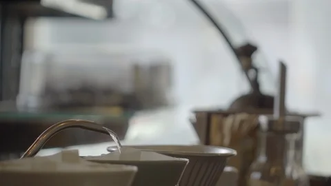 Slow motion shot of coffee dripping Stock Footage 96224342