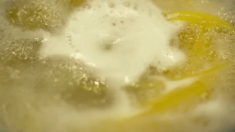 Slow motion shot of cooking spaghetti in a pot Stock Footage 84768351