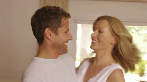 Slow motion shot of couple dancing in house. Stock Footage 43659184