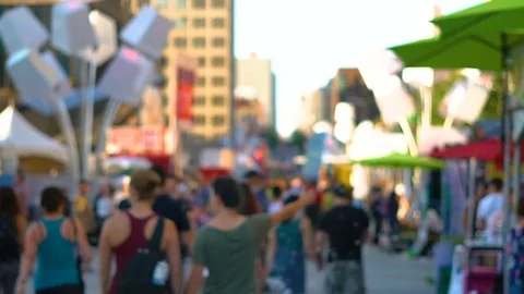 Slow motion shot of a crowd walking in the streets of Montreal Stock Footage 77970955