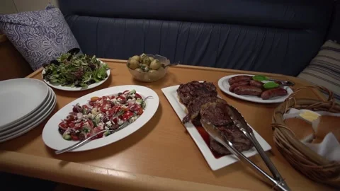 Slow Motion Shot Of Dinner On Table In The Boat Stock Footage 145815716