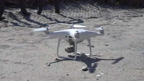 Slow Motion Shot of DJI Drone Taking Off Stock Footage 154755618