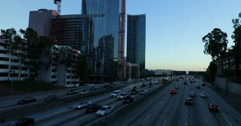 Slow motion shot of Downtown Los Angeles and traffic on 110 highway. California. Stock Footage 81572457