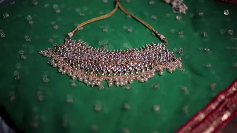 A slow motion shot of elegant Indian bridal jewelry Stock Footage 327906310