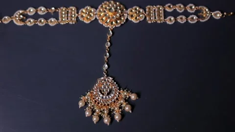 A slow motion shot of elegant Indian bridal jewelry Stock Footage 327906320