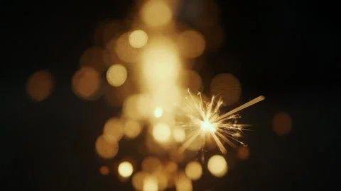 Slow motion shot of explosion gold lights sparkles. Stock Footage 276100183
