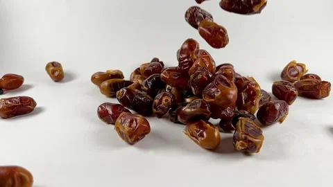 Slow motion shot of falling dates Stock Footage 276419738