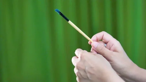 Slow motion shot of falling glitter colour from brush big close up (2) Stock Footage 199279117