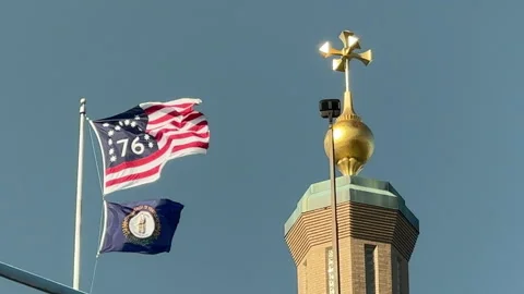 Slow motion shot of flag flying over Roebling Bridge Stock Footage 256950802