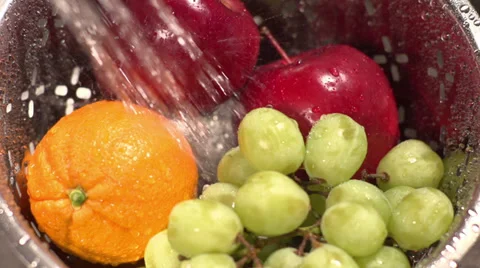 Slow motion shot of fruit washed with spraying water 스톡 동영상 34425710