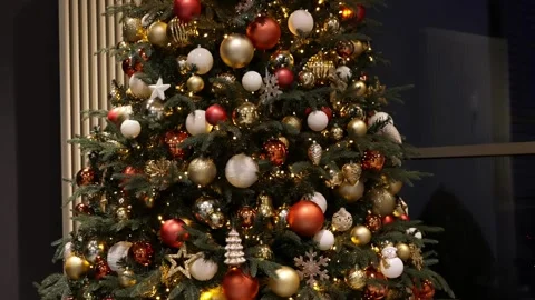 Slow Motion Shot of Fully Decorated Christmas Tree with Lights Video stock 321429702
