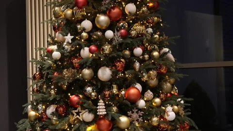 Slow Motion Shot of Fully Decorated Christmas Tree with Lights Video stock 321429718