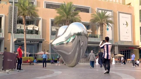 Slow motion shot of huge mirror in dubai mall Stock Footage 253657079