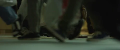 Slow motion shot of human feet walking in hallway at dark, Tokyo Stock Footage
