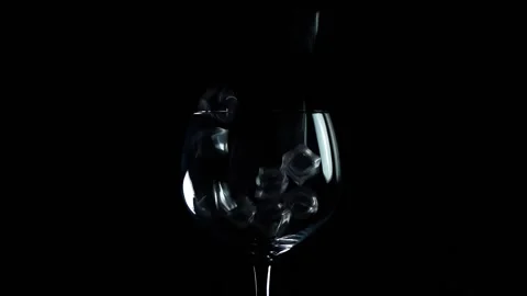 Slow Motion Shot Of Ice Being Added To Glass Stock Footage 155981858